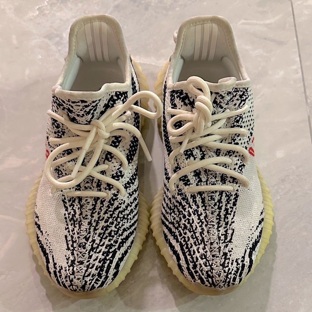 Adidas Yeezy Black and White Sneakers with Red Accents
